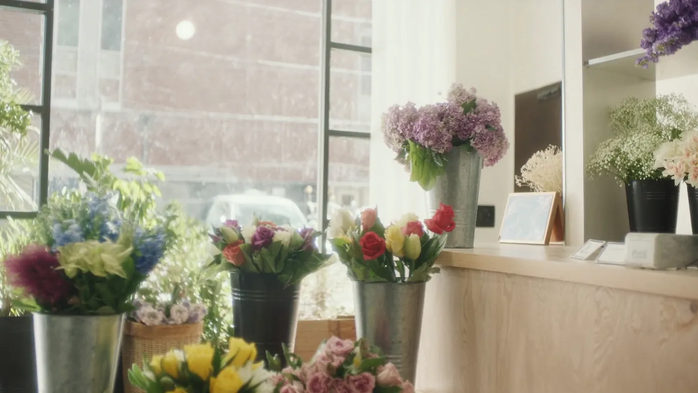 A bright modern flower shop full of fresh colorful blooms